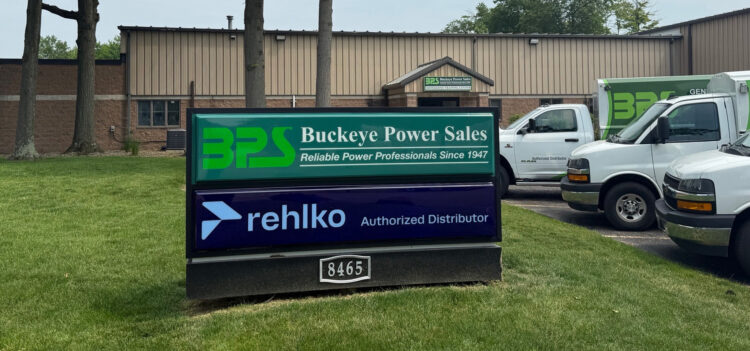 close up view of Buckeye Power Sales and Rehlko sign in front of building